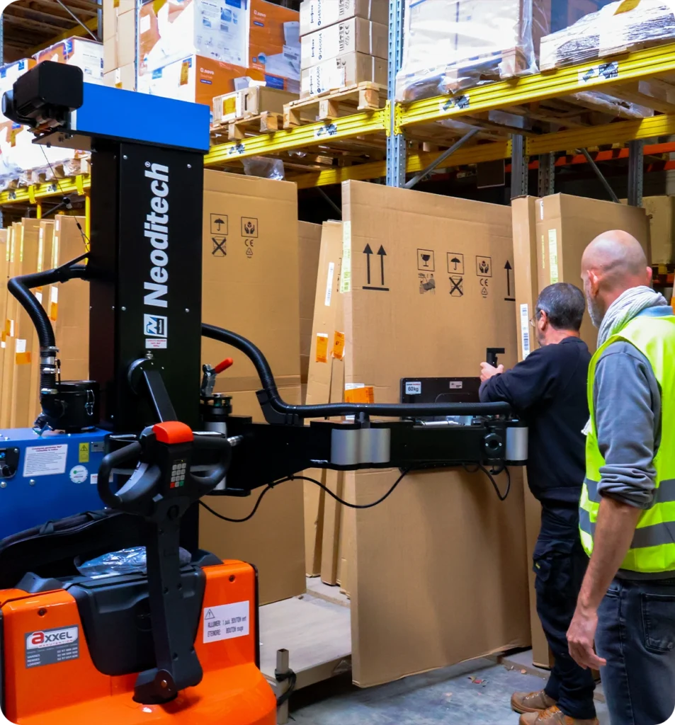 Neoditech logistics picking manipulator picking up and placing a 40 kg shower wall using a vacuum gripper.