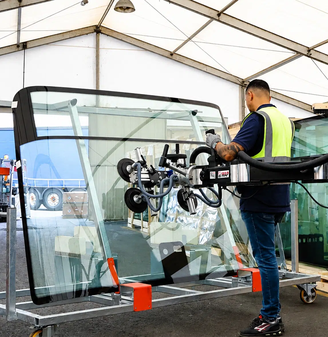 Handling a tractor windshield using the SCARA TITAN manipulator arm