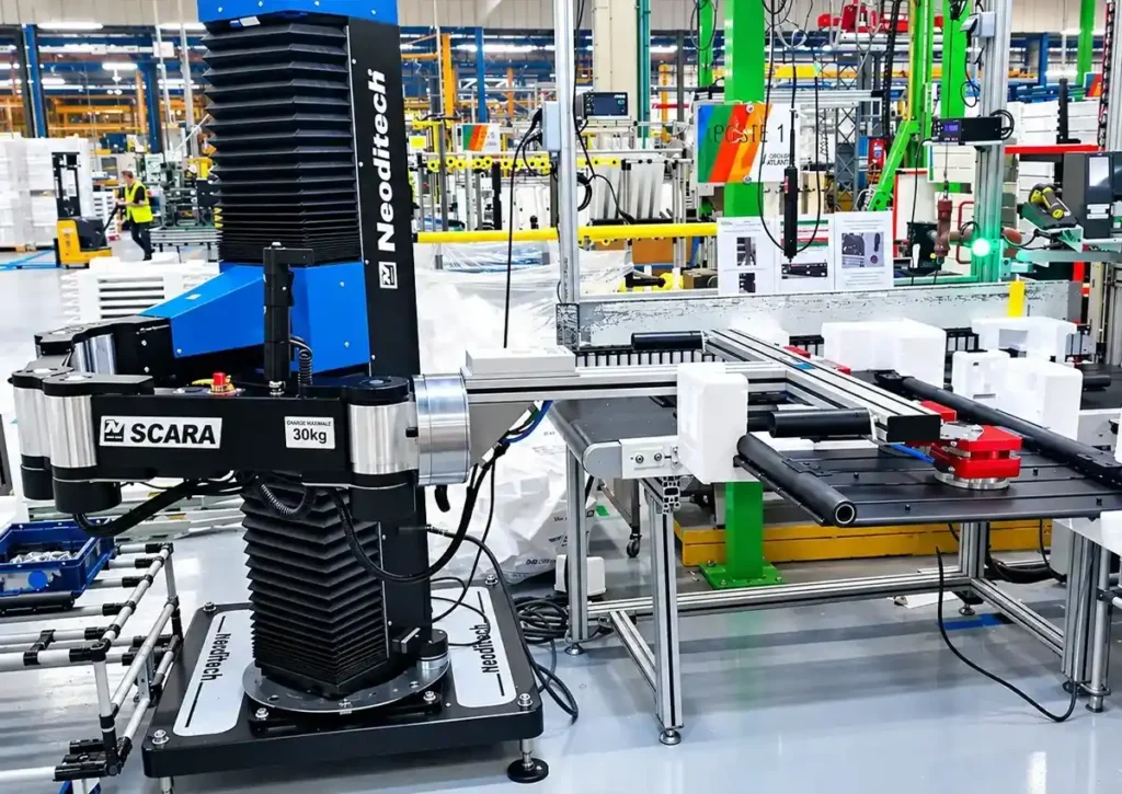 Neoditech SCARA TITAN manipulator arm handling a heated towel rail, ergonomic lifting equipment industry