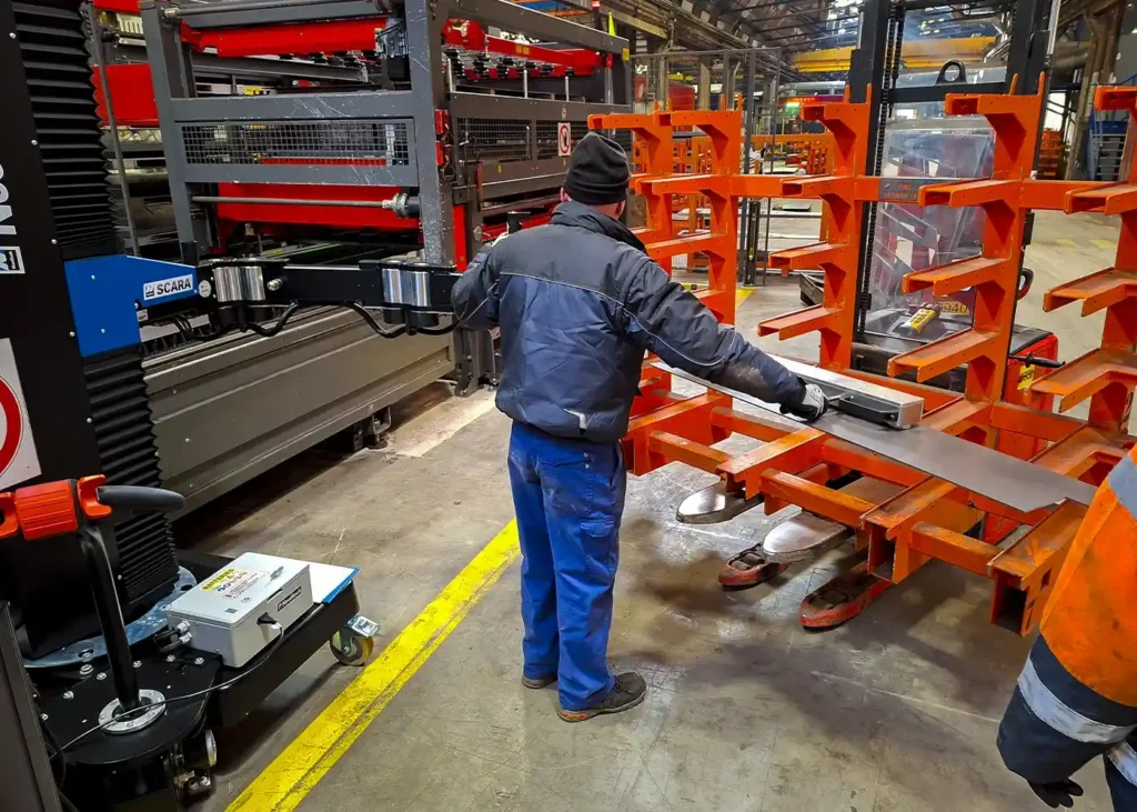 Handling a sheet metal panel using the SCARA TITAN manipulator arm - automotive industry material handling