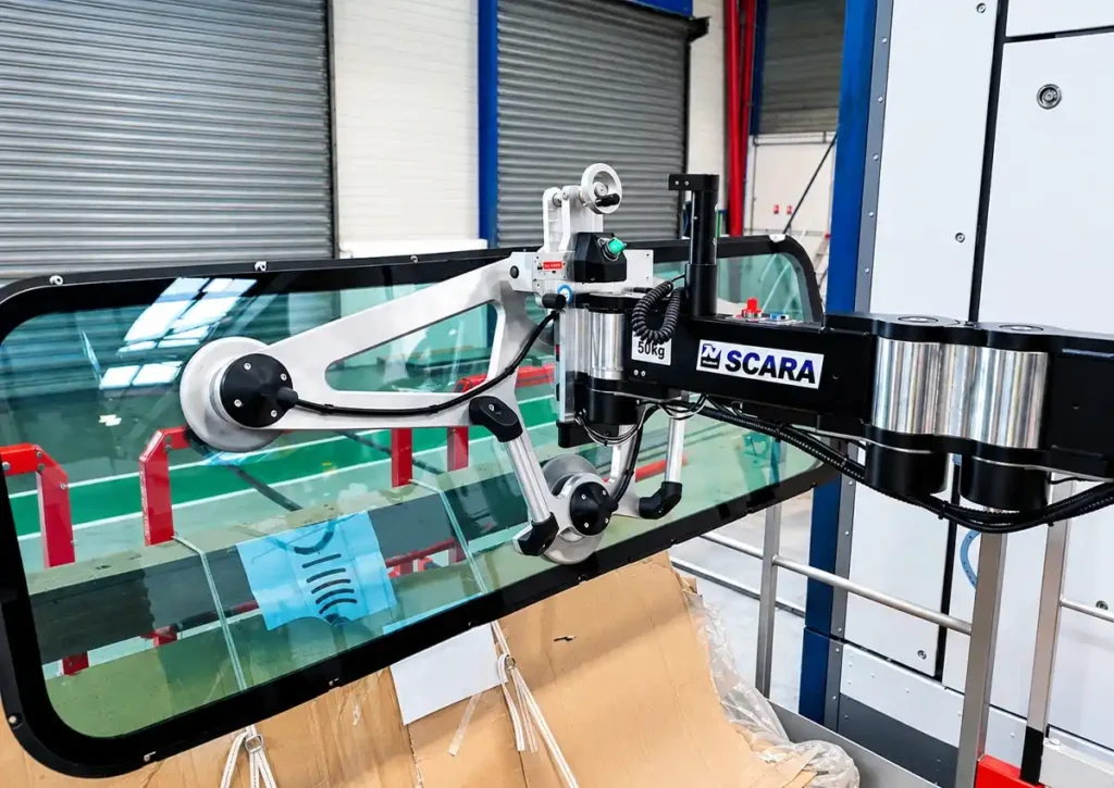 Railway industry material handling: vacuum suction gripper fitted on a Neoditech SCARA TITAN manipulator arm handling a train window