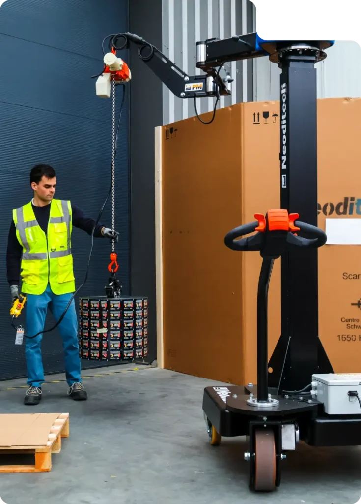 Label reel handling using the Neoditech Mobile Jib Crane fitted with an expansion clamp, for logistics and warehouse ergonomic handling